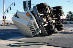 a semi truck on its side